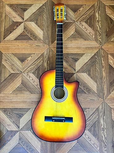 gitara: Klassik/akustik gitara – cutaway korpuslu, sunburst (sarı–qəhvəyi — 1