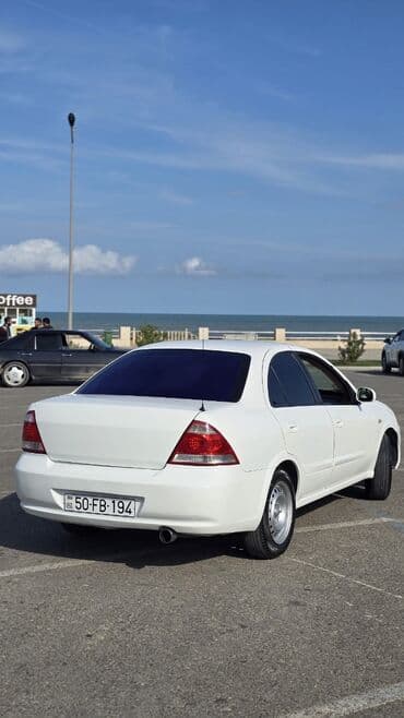 опель зафира а: Nissan Almera Classic: 1 l | 2007 il Sedan — 10