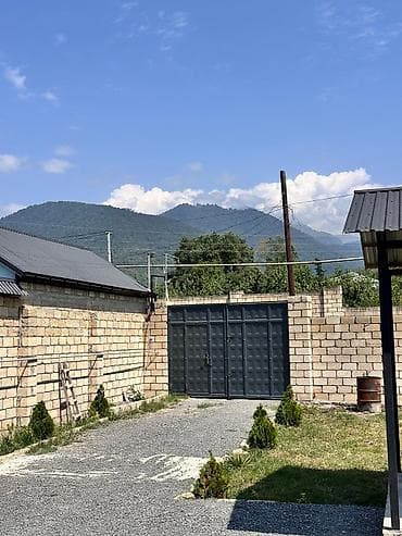 ev al: Qəbələ rayonu Həmzəlli kəndi 28may kucesi 4.4 sot çıxarışlı evin — 2
