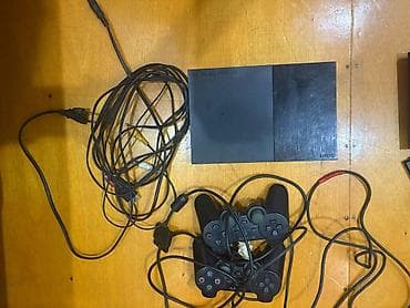 PS 2 slim problemsiz ideal vəziətdə şunurları pultları hamısı verilir