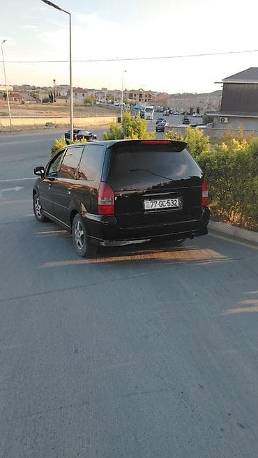 Nəqliyyat: Mitsubishi Chariot: 2.4 l | 2000 il 5000 km Universal — 4