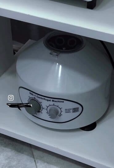 Ağ rəngdə, 800-1 model nömrəli sentrafuqanın avadanlığı. Tibbi və ya