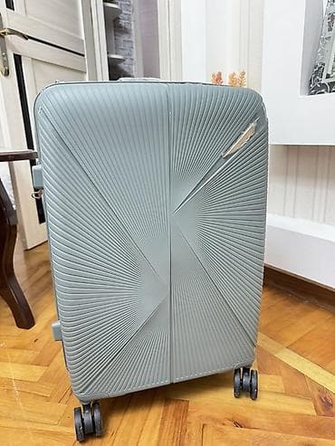 Sərt korpuslu səyahət çamadanı – boz rəng - Material: yüngül və