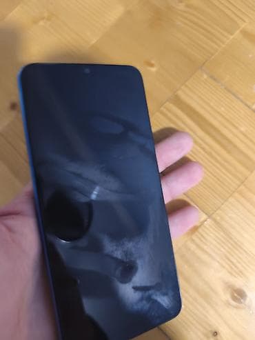 mobile legend: Məhsul: Xiaomi Redmi smartfonu (mavi rəng) Xüsusiyyətlər: - Arxa — 2