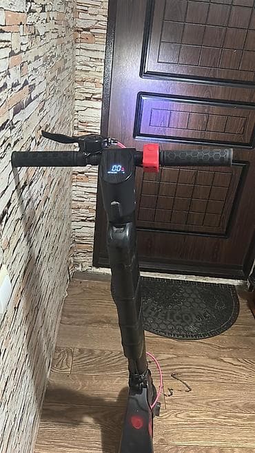 Elektrik skuter – şəhərdaxili rahat hərəkət üçün - Rəng: qara - Ön və lalafo.az -da Elektrik skuter – şəhərdaxili rahat hərəkət üçün - Rəng: qara - Ön və