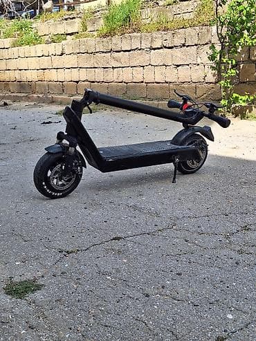 skuturlar: İşlənmiş Elektrik samokat 10", > 1000 Vt, 36 - 45 km/s, Ünvandan götürmə — 5