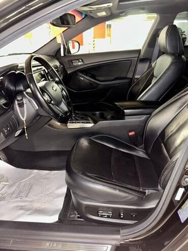 xrom diski: Kia Optima – qara rəng, sedan kuzov. Şəhərdaxili və magistral yollarda — 12