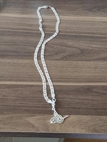 gumuş boyunbagı: Boyunbağı, Gümüş, Ünvandan götürmə — 2
