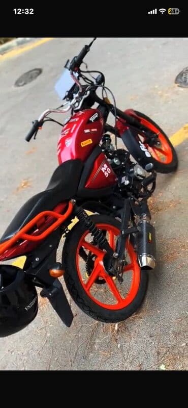 Motonəqliyyat: Satılır: qırmızı rəngli 50cc şəhər daxili motosiklet Xüsusiyyətlər: - — 1