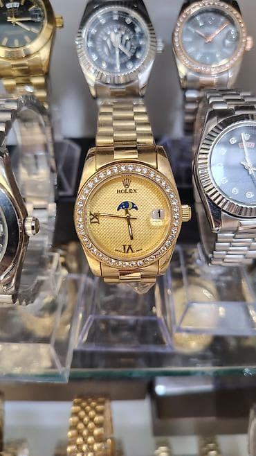 Наручные часы: Məhsul: Kvars mexanizmli dəbli saatlar (klassik “Datejust” üslubunda) — 9