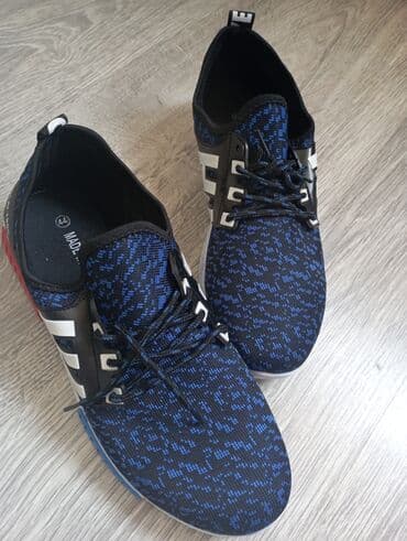 женские кроссовки mizuno: 1ci kişi ayaqqabısı 42razmerle de gedir, 2ci qara 44 razmer — 1