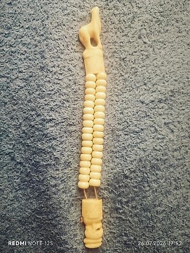 təsbəh: Təsbeh təmiz ndəndir . Əl işi və oymadır . Təsbehin bir başı Uluyan — 2