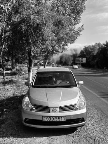 mersedes disk r15: Nissan Tiida: 1.6 l | 2006 il Sedan — 5