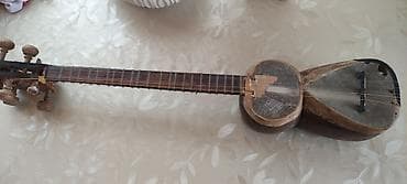 gitara klasik: Məhsul: Tar (xalq simli musiqi aləti).Evde usaqindir illərin — 5