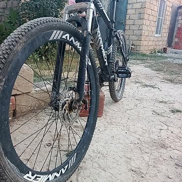 dvd disklər: Dağ Velosipedi – ANNMER təkərli MTB Xüsusiyyətlər: - Çərçivə — 7
