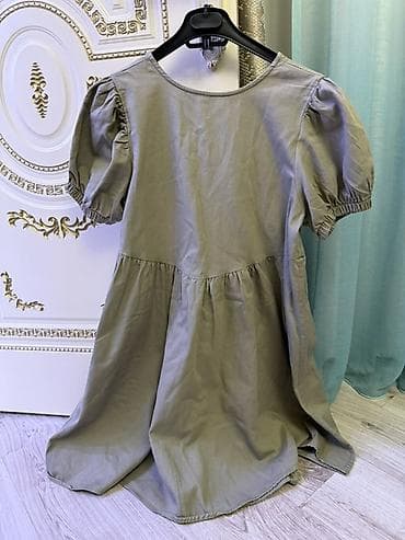 donları: Uzunluğu dizdəndir, sadəcə 2 dəfə geyinilib. Zeytun-yaşıl rəngdə — 3