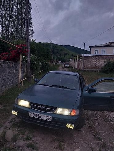 qosqu satisi: Nissan Sunny sedan - Kuzov: sedan, tünd yaşıl rəng - Mühərrik: benzin — 1