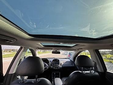 Hyundai Tucson: 0.2 l | 2009 il Krossover — 7