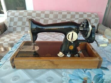 qədimi qəpiklər: Qədim əl tikiş maşını — 2