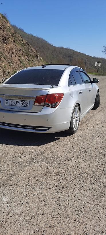 nissan sunny 2005: Chevrolet Cruze: 1.4 l | 2011 il 370000 km — 4