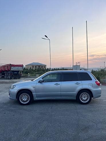 sam diskiler: Mitsubishi Airtrek (RHD) – şəhər və uzun yol üçün komfortlu krossover — 3