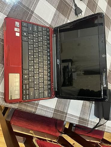 Apple MacBook: Acer Aspire One AO751h-52Br netbuku - Rəng: qırmızı (gövdə), qara — 2