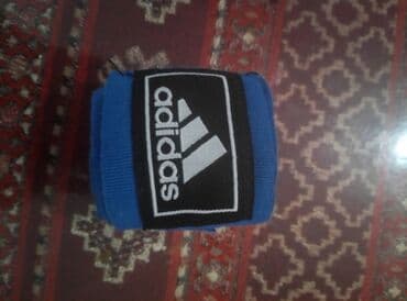 usaqliq yoluna qoyulan samlar: Məhsul: Boks/ MMA əl sarğıları (Adidas loqolu) - Rəng: mavi - Uzunluq — 4