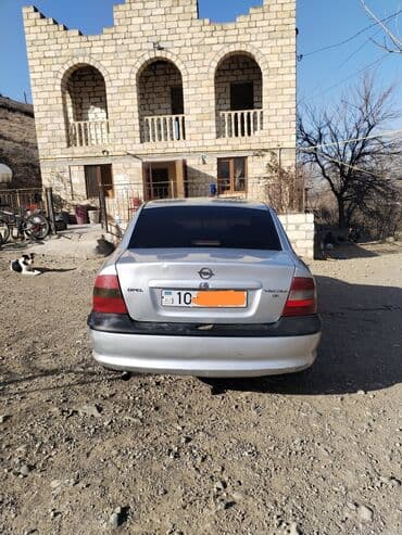 Tavalar: Opel Vectra: 1.6 l | 1998 il 357433 km Sedan — 6