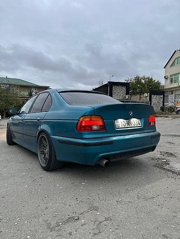 teker cixardan: BMW 5 series: 2.5 l | 1996 il Sedan — 2