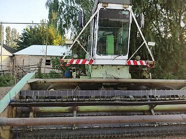 soyuducu maşınlar: Claas E 303 biçin kombaynı - Özgedəyişən ön biçin qurğusu: barabanlı — 7
