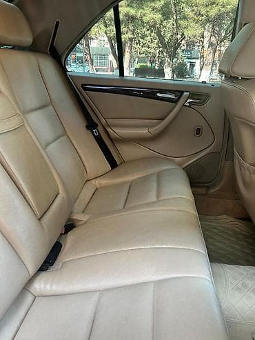 priora diskleri: Mercedes-Benz C-Sinfi sedan (W202) – tünd yaşıl rəng, bej dəri salon — 4