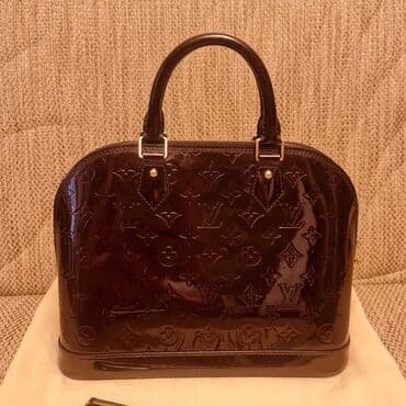 qaşlı çanta: Əl çantası, Louis Vuitton — 1