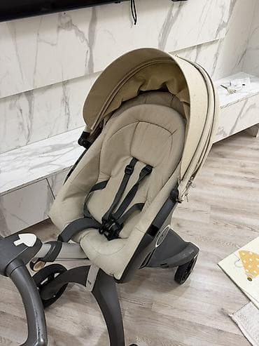 купить детскую коляску бу: Stokke brendi. 2300 azn alinib yeni kimi qalib. Tutacaqi yuxarida — 3