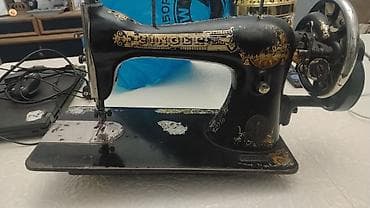 demir masinlar: Məhsul: Singer mexaniki tikiş maşını Təsvir: - Klassik, çarxla idarə — 2
