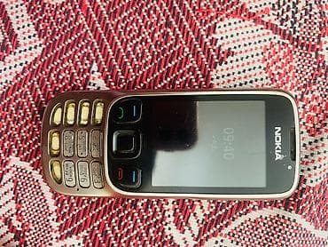 Nokia 6700 Slide, rəng - Gümüşü, Düyməli lalafo.az -da Nokia 6700 Slide, rəng - Gümüşü, Düyməli