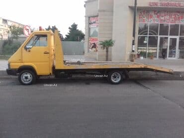 купить грузовой эвакуатор: Sarı rəngli evakuator, nəqliyyat vasitələrini daşımaq üçün nəzərdə — 6