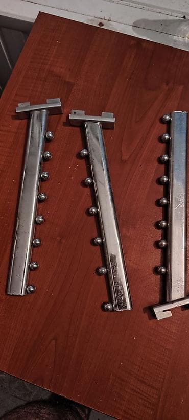 Mağaza vitrinləri üçün metal asqı çubuqları (slatwall/mesh/delikli