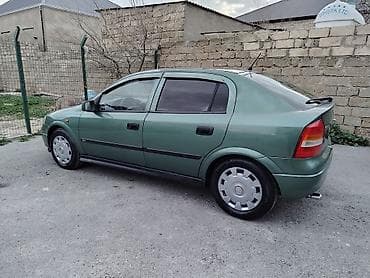 formula tekerler: Opel Astra: 1.8 l | 1999 il 250000 km Sedan — 4