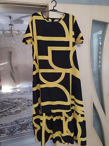 b ortuk var: Boyukbeden 3xl.ideal vezyetdedi.Qadın paltarı – qara üzərində iri sarı — 1