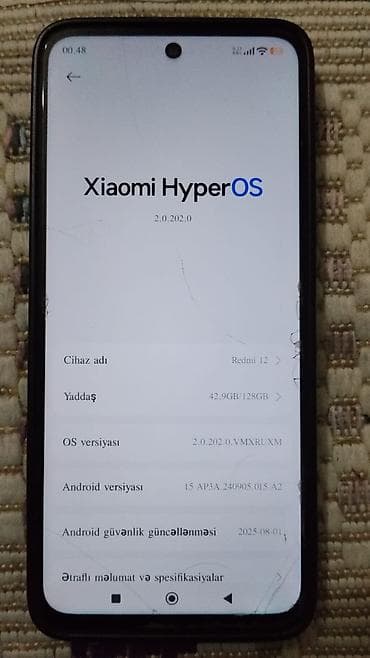 телефон fly с хорошим аккумулятором: Redmi 12, 128 ГБ, цвет - Черный, Отпечаток пальца — 3