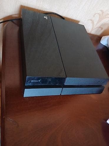 televizor boyuk ekran: Sony PlayStation 4 (PS4) oyun konsolu - Model: PS4 “Fat” (orijinal — 2