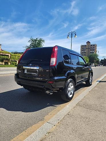 xtrail: Nissan X-Trail: 2.4 l | 2003 il Ofrouder/SUV — 4