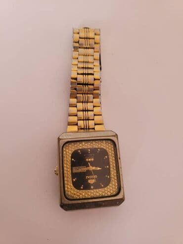 el fecr saat: İşlənmiş, Qol saatı, Orient, rəng - Qızılı — 6