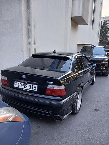 lada salon: BMW 3 Seriya E36 sedan, qara rəng. M-üslub bədən dəsti və ön splitter — 4
