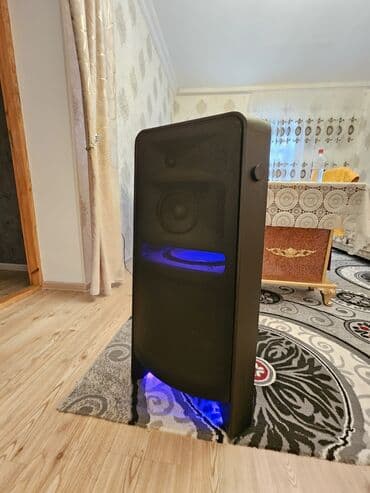 telefon plata satisi: Samsung partı spikeri (Bluetooth DJ audio sistemi) üstündə planşet — 3