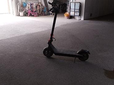 ninebot e2 pro: Elektrik skuter – şəhər içi rahat və səssiz hərəkət üçün — 1