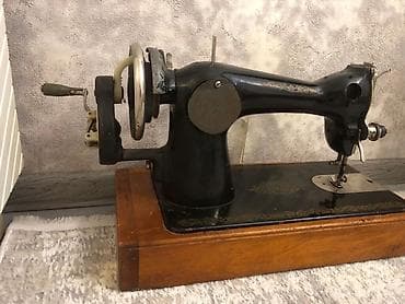 taxta qaşıq: Klassik mexaniki tikiş maşını - Çuqun korpuslu, ağır və sabit — 3