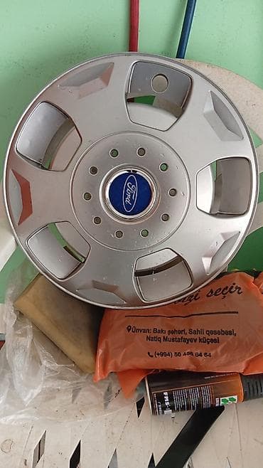 disklər r16: Yeni Kolpak Ford R 15 — 1