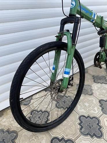velosipet: Qatlanan dağ velosipedi – yaşıl rəng Xüsusiyyətlər: - Qatlanan orta — 7
