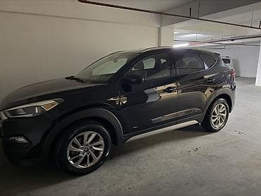 Hyundai Tucson, qara rəngli kompakt krossover/SUV. il 2017 (vin 2018)